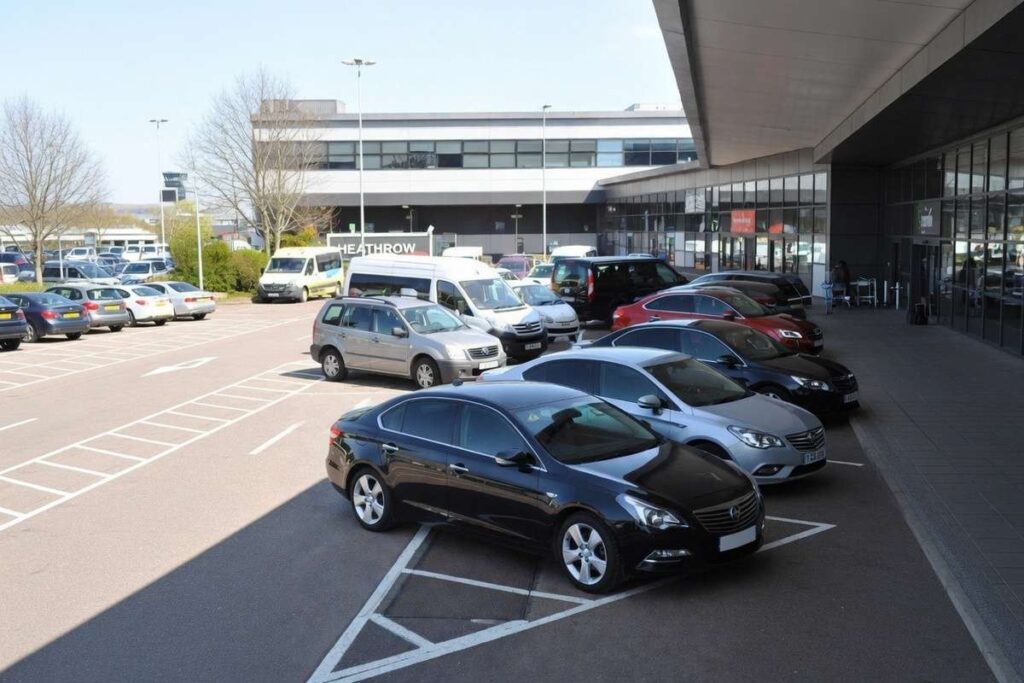 premium rental car fleet parked airport 2026