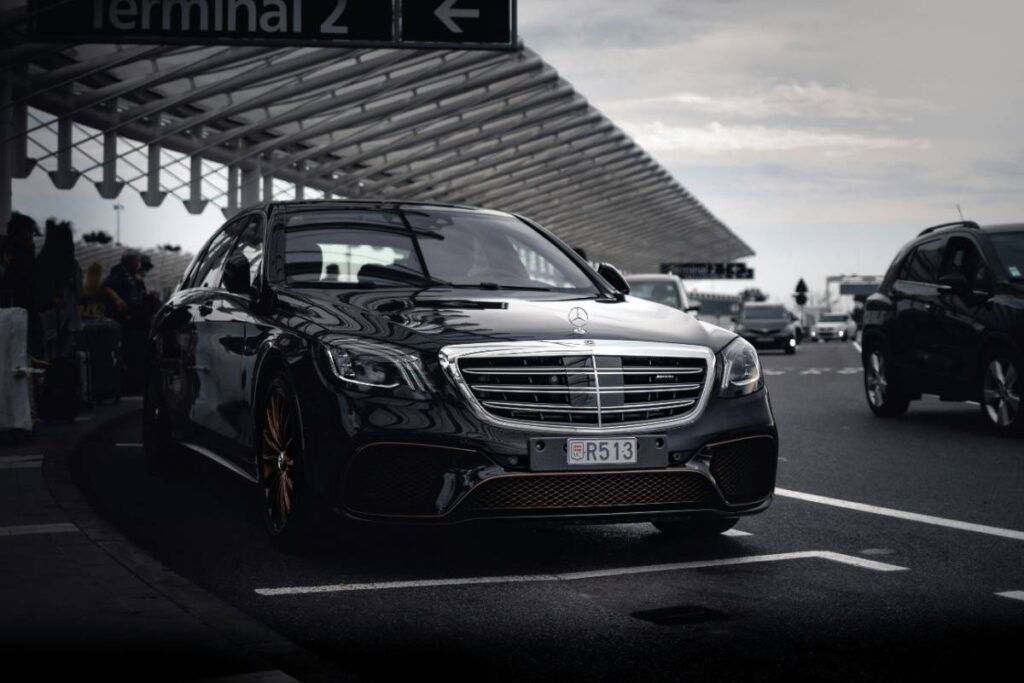 executive business traveller car rental counter airport 2026