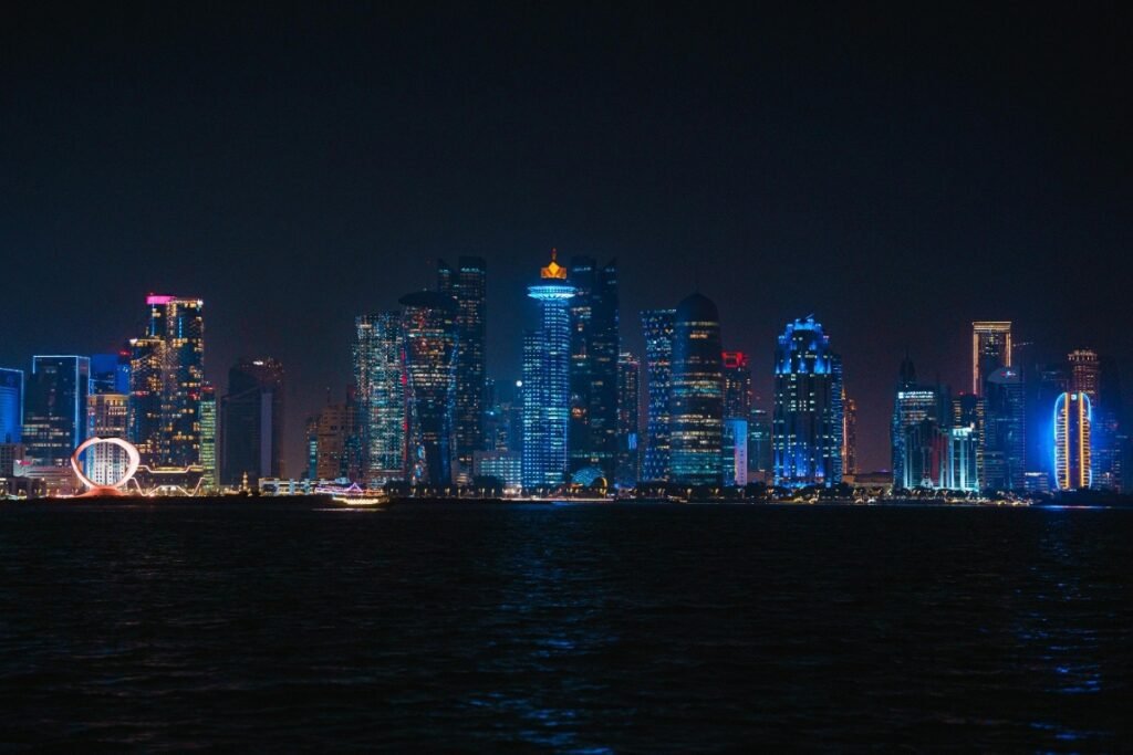 Doha Corniche waterfront promenade skyline Qatar 2026 sunset
