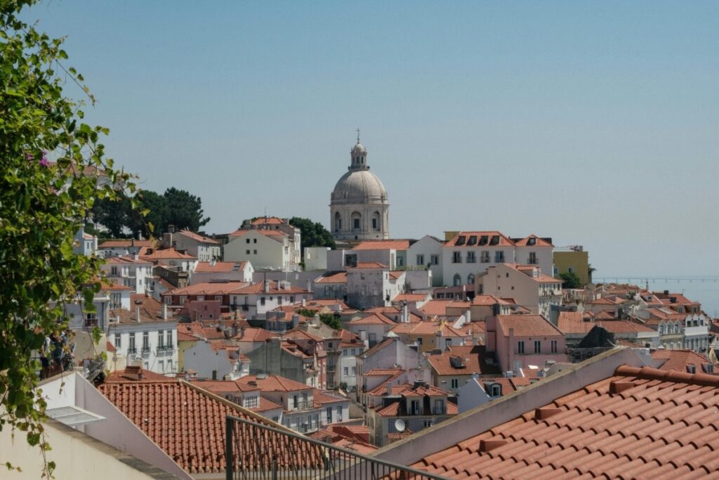 Alfama District - Sunset Weekly