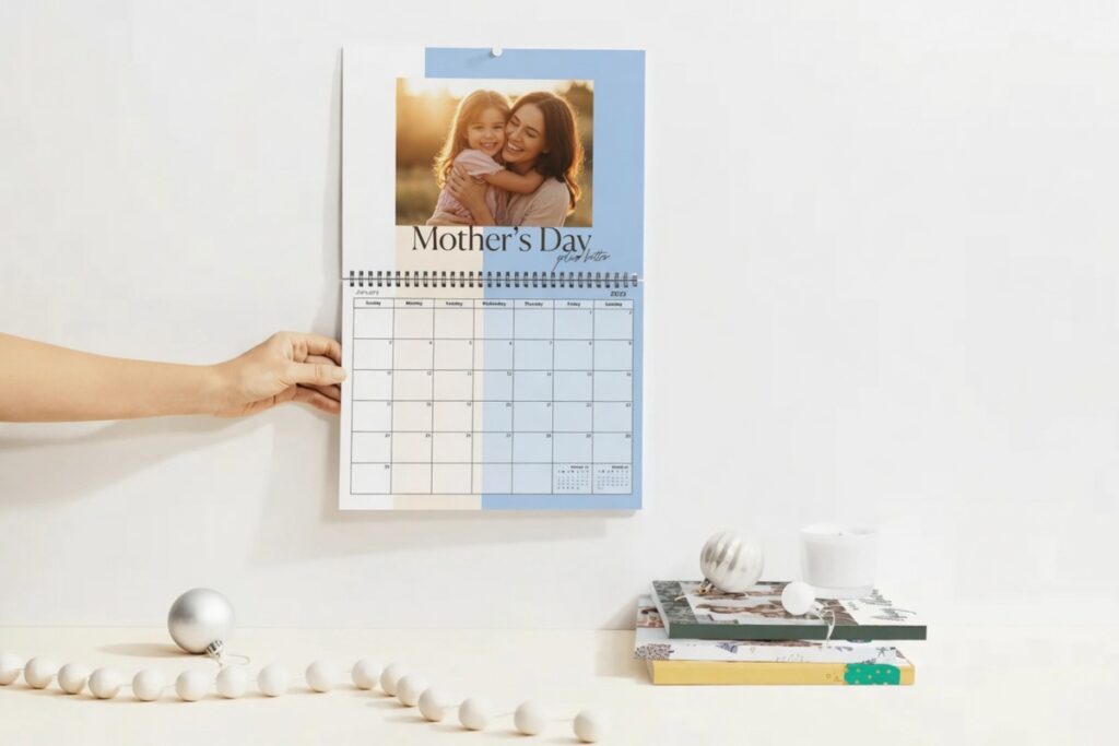 Mixbook - 3. Personalised Wall Calendar (Photo-Per-Month) – Best For a Year-Round Presence in Mum’s Kitchen or Home Office